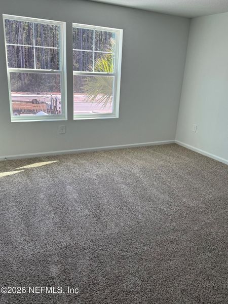 Spacious, unfurnished interior of a new home in Liberty Cove, Yulee (Image 27).