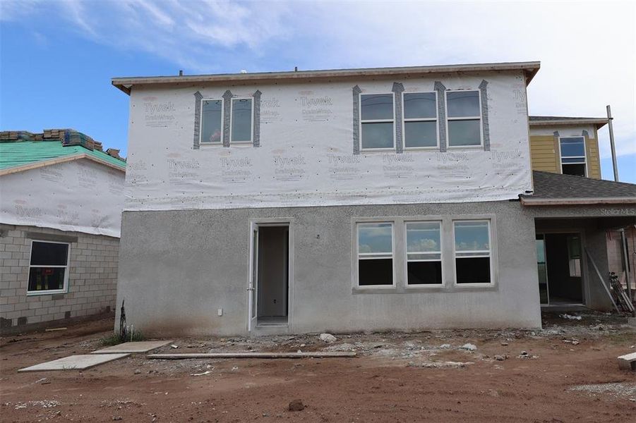 In-progress construction of a new home in Center Lake on the Park, St. Cloud, FL (Image 10).