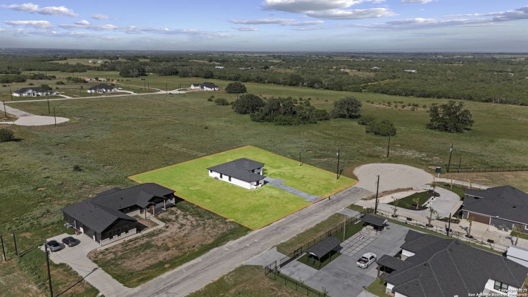 Front exterior of a new home in , Floresville, TX, highlighting curb appeal (Image 27). Front exterior of a new home in , Floresville, TX, highlighting curb appeal (Image 27).