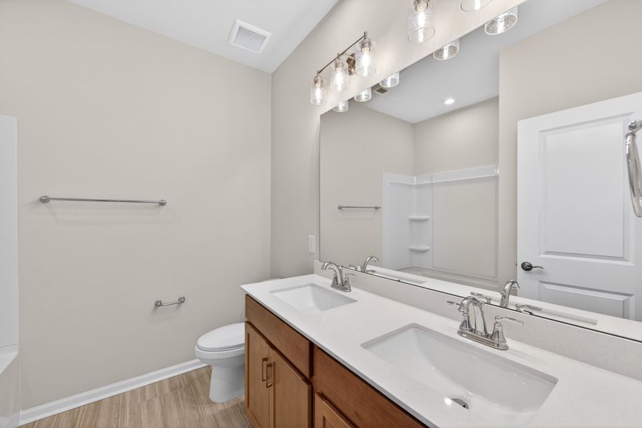 Furnished interior view inside a new home in Ellis Townes, Charlotte (Image 12). Furnished interior view inside a new home in Ellis Townes, Charlotte (Image 12).
