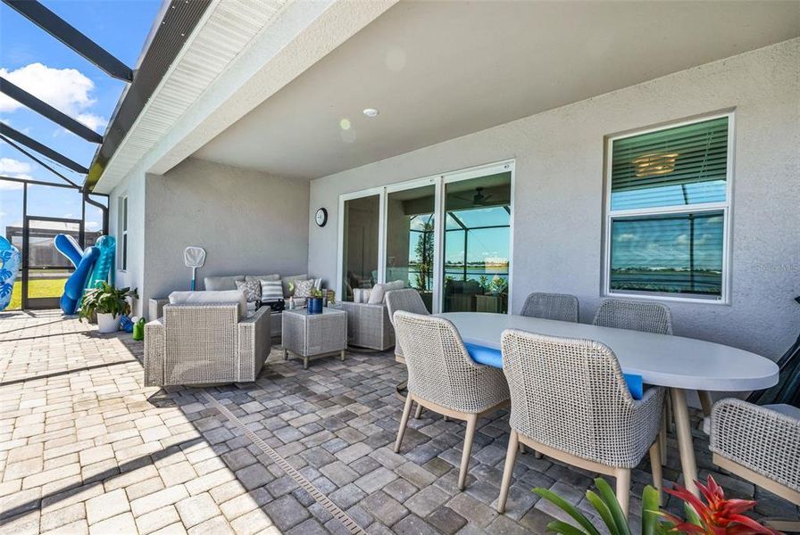 Exterior details and patio area of a home in Palm Lake at Coco Bay, Englewood (Image 3). Exterior details and patio area of a home in Palm Lake at Coco Bay, Englewood (Image 3).