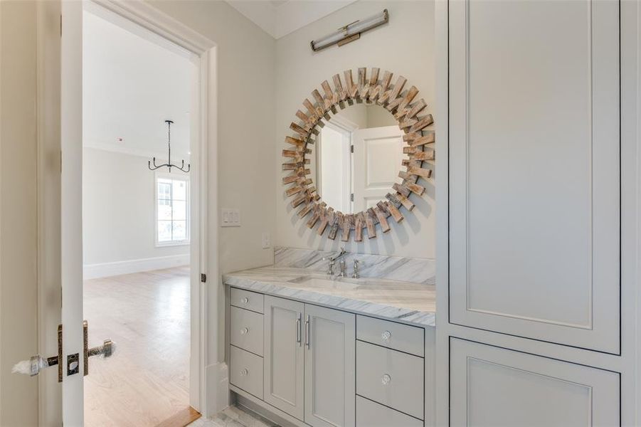 Bathroom featuring vanity and hardwood / wood-style flooring