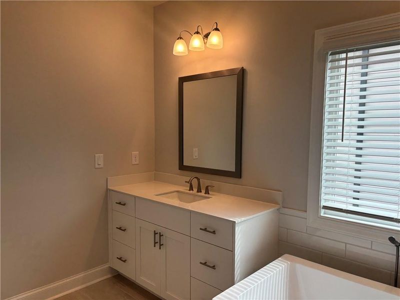 Furnished interior view inside a new home in Brackley Single Family, Cumming (Image 20).
