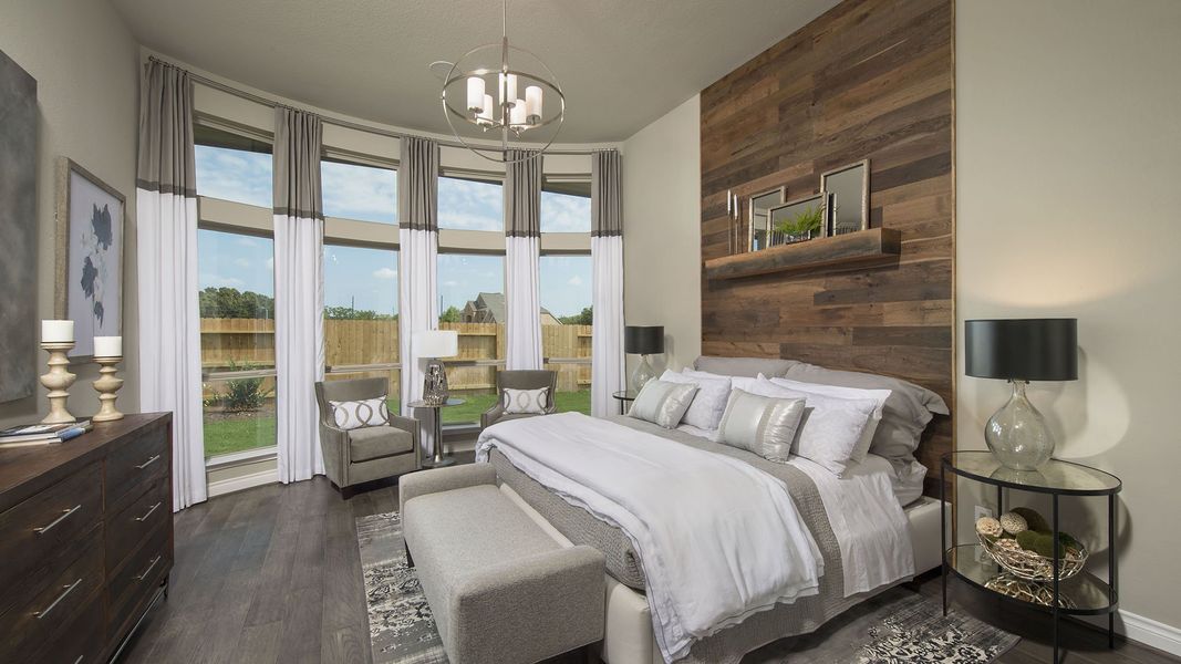 Representative furnished interior of a home built from the 3578W by Perry Homes in Lakes of Cane Island, Katy (Image 38).