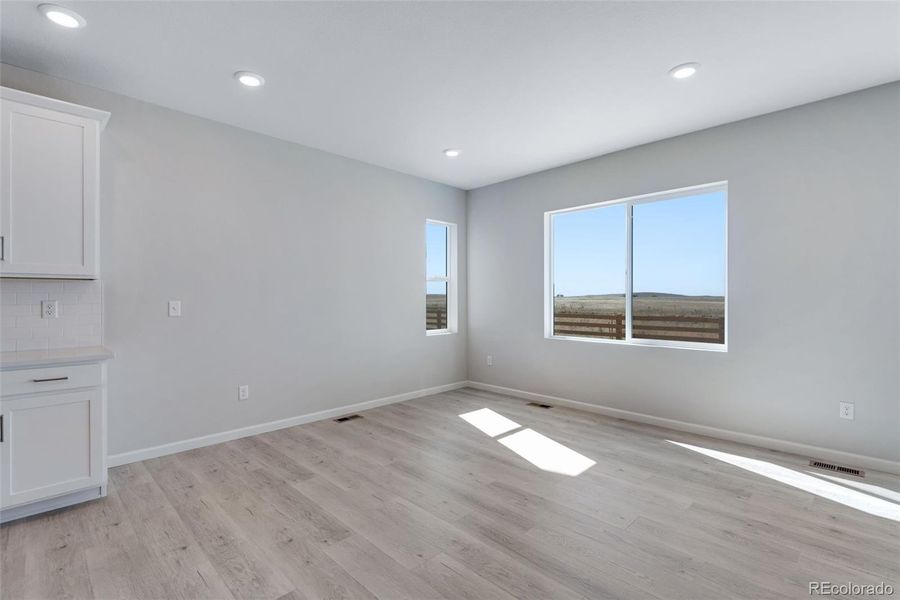 Spacious, unfurnished interior of a new home in Reunion Ridge, Commerce City (Image 29).