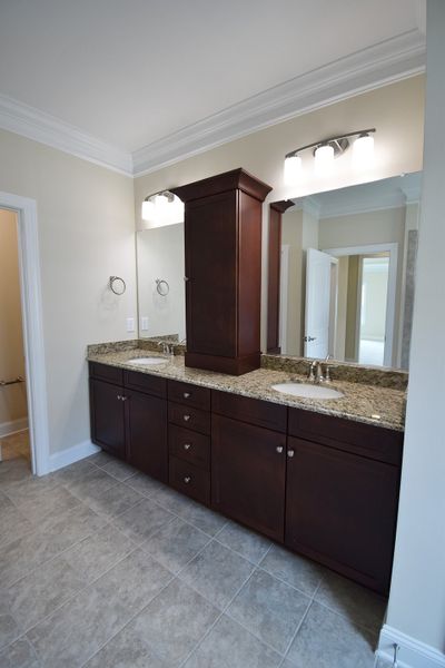 Representative furnished interior of a home built from the Cosmopolitan by Keystone Homes NC in Weybridge, Burlington (Image 11).