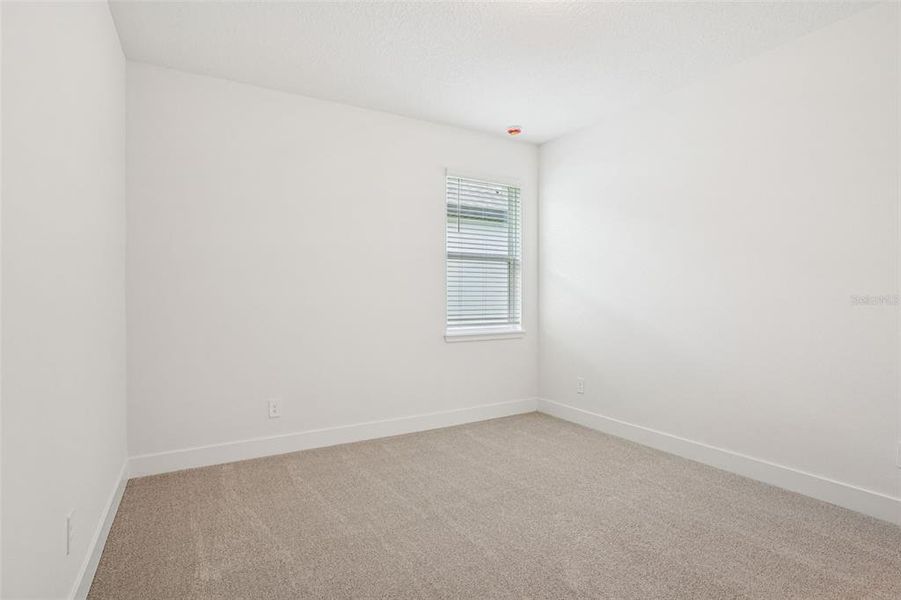 Spacious, unfurnished interior of a new home in Ridgehaven - Signature Series, Ormond Beach (Image 18).