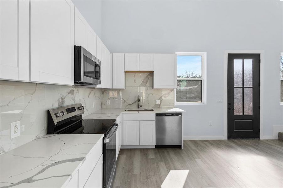 Furnished interior view inside a new home in , Granbury (Image 7).