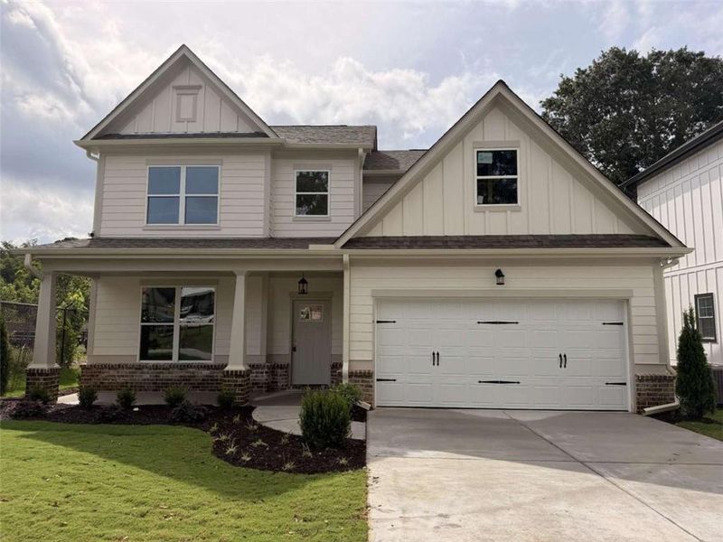 Front exterior of a new home in , Flowery Branch, GA, highlighting curb appeal (Image 1). Front exterior of a new home in , Flowery Branch, GA, highlighting curb appeal (Image 1).