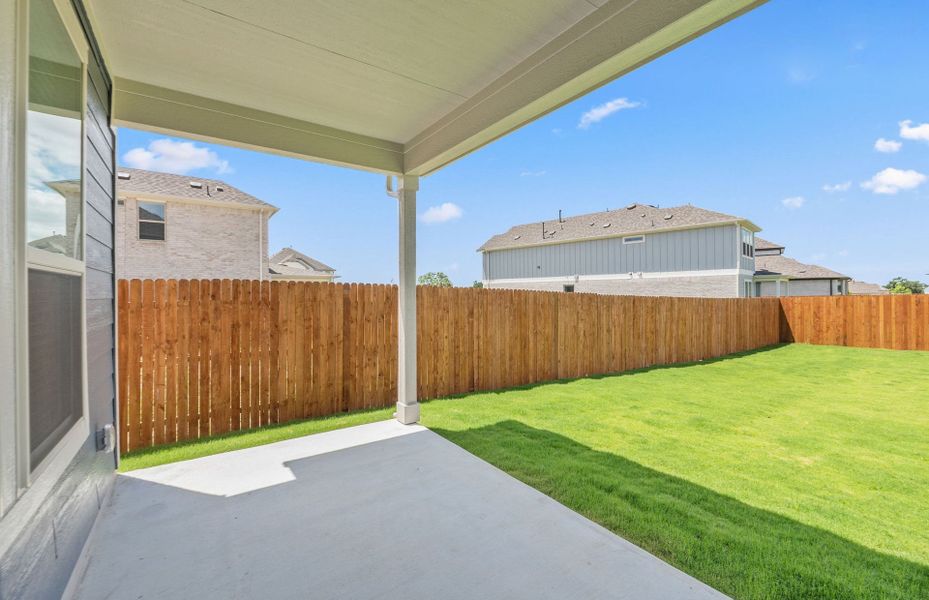 Exterior details and patio area of a home in Santa Rita Ranch, Liberty Hill (Image 26).
