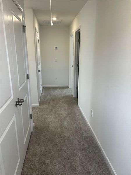 This interior hallway offers easy access to multip