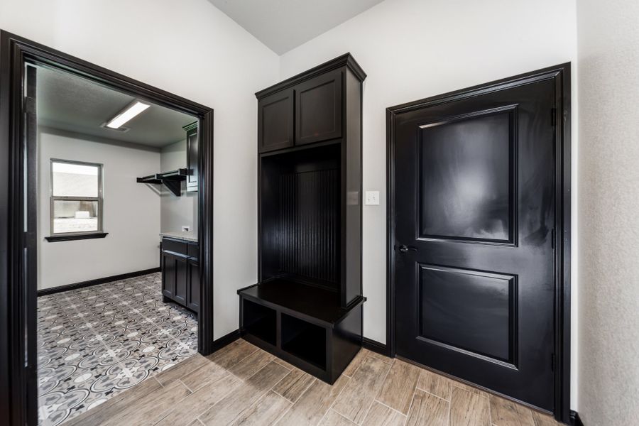 Representative furnished interior of a home built from the The Bennett by Doug Parr Custom Homes in Kessler Farms, Brock (Image 7).