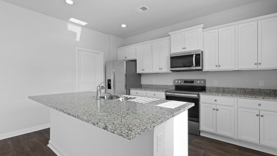 Furnished interior view inside a new home in The Ranch, Holly Hill (Image 8).