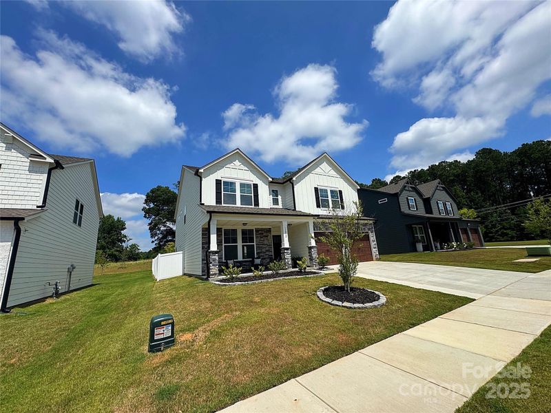 Front exterior of a new home in Enclave at Caldwell, Charlotte, NC, highlighting curb appeal (Image 2).