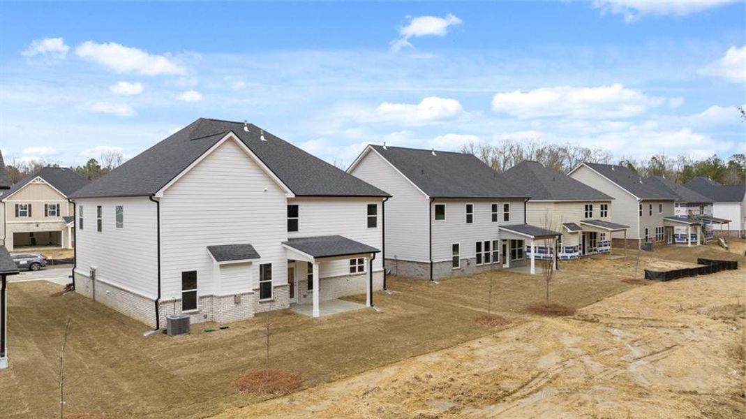 Exterior details and patio area of a home in Wildwood, Covington (Image 4). Exterior details and patio area of a home in Wildwood, Covington (Image 4).