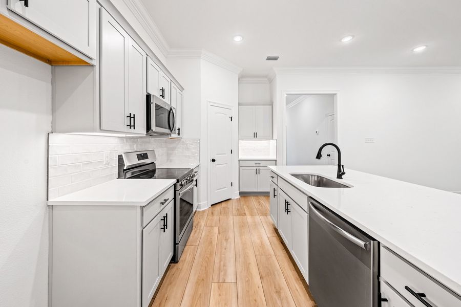 Furnished interior view inside a new home in Eagle Pointe, Pensacola (Image 6).