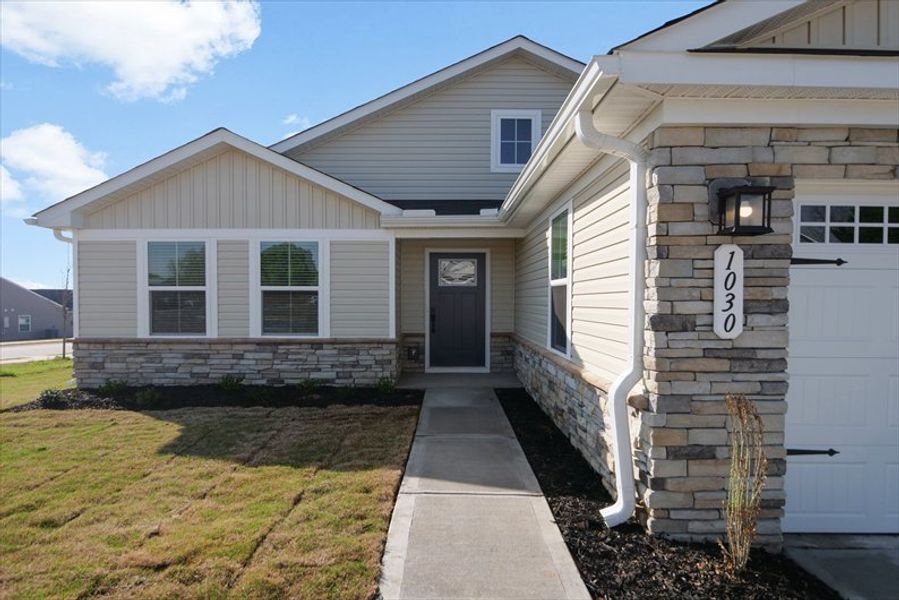 Exterior details and patio area of a home in Reidville Town Center Cottages, Duncan (Image 2).