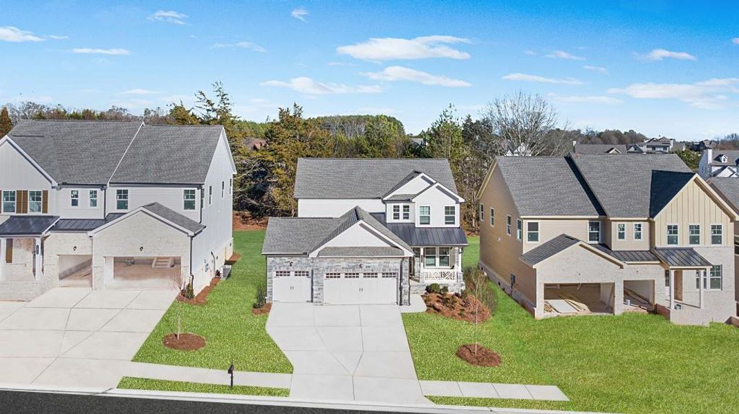 Front exterior of a new home in Willow Creek, Watkinsville, GA, highlighting curb appeal (Image 1).