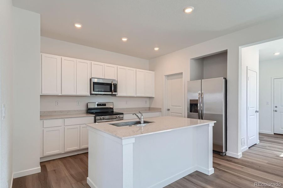 Furnished interior view inside a new home in Eastcreek Farm: Paired Homes, Thornton (Image 4).