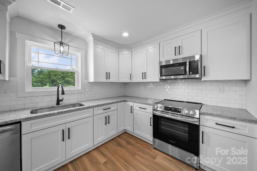 Furnished interior view inside a new home in , Wingate (Image 7).