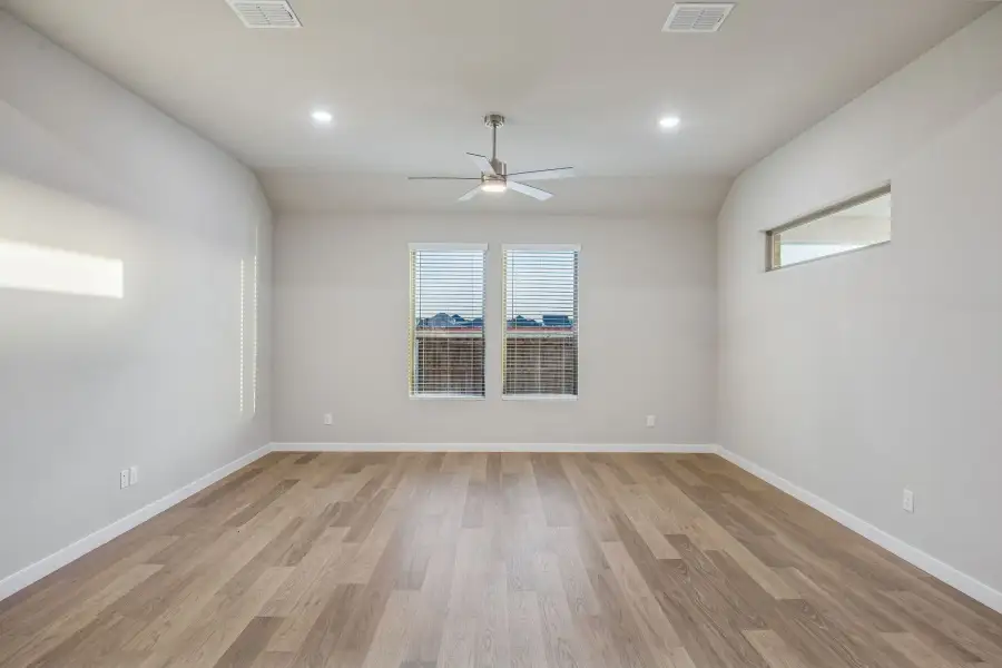 Living Room in the Wimbledon home plan by Trophy Signature Homes – REPRESENTATIVE PHOTO Living Room in the Wimbledon home plan by Trophy Signature Homes – REPRESENTATIVE PHOTO