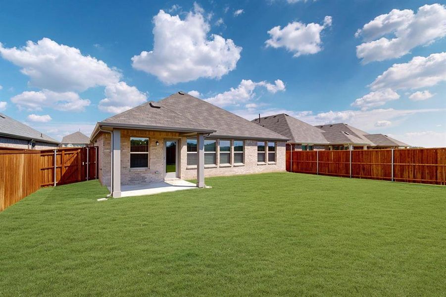 Exterior details and patio area of a home in Meadow Park, Denton (Image 4). Exterior details and patio area of a home in Meadow Park, Denton (Image 4).