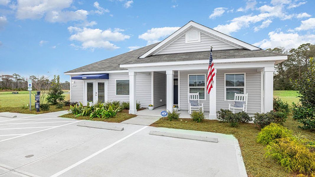 Front exterior of a new home in Cottonwood Place, Tabor City, NC, highlighting curb appeal (Image 2). Front exterior of a new home in Cottonwood Place, Tabor City, NC, highlighting curb appeal (Image 2).