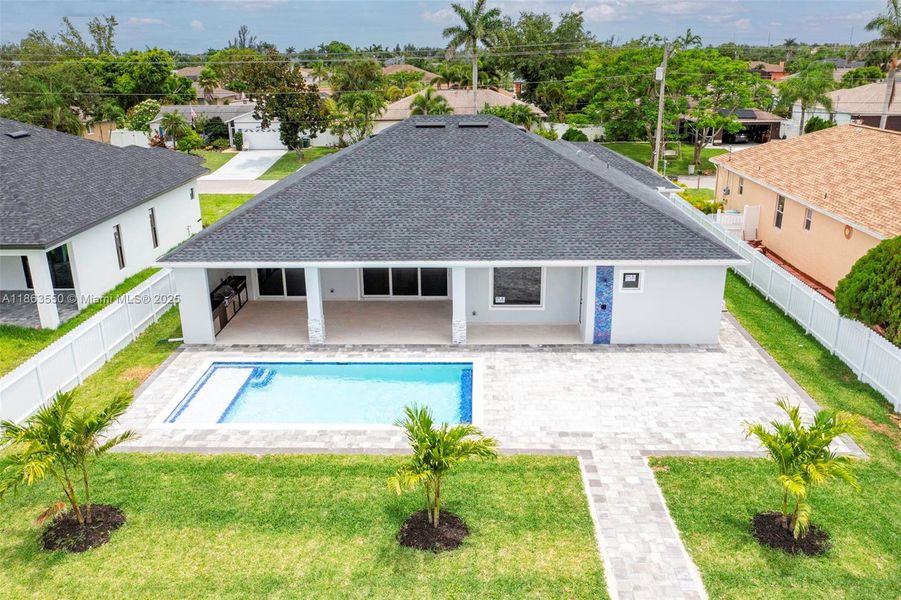 Front exterior of a new home in , Cape Coral, FL, highlighting curb appeal (Image 31). Front exterior of a new home in , Cape Coral, FL, highlighting curb appeal (Image 31).