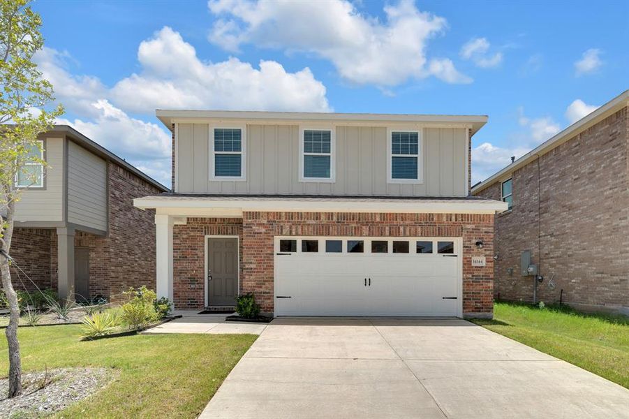 Front exterior of a new home in Creekview Fossil Ridge, Pilot Point, TX, highlighting curb appeal (Image 17).