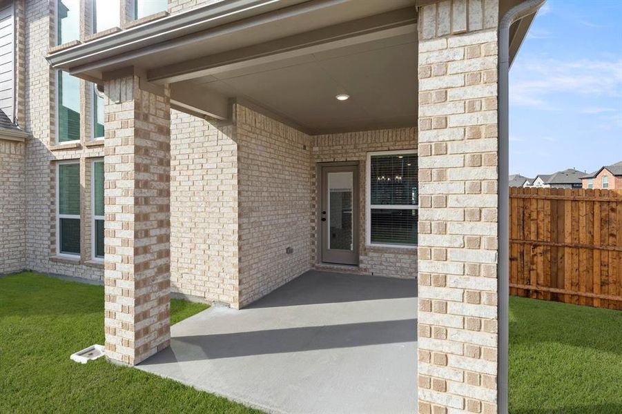 Exterior details and patio area of a home in Woodcreek, Fate (Image 20).