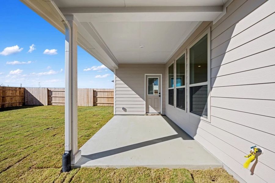 Exterior details and patio area of a home in Willow Springs, Buda (Image 27).