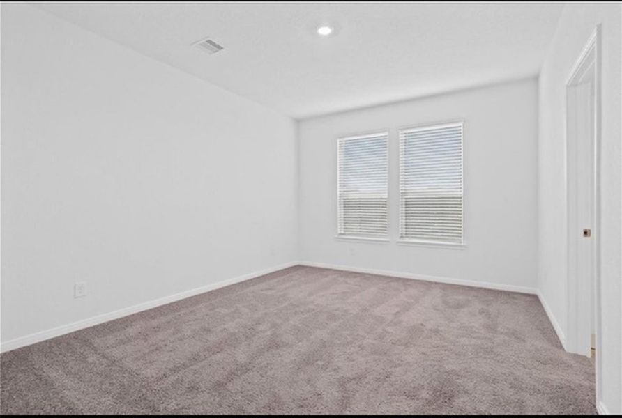 Spacious, unfurnished interior of a new home in Sunterra, Katy (Image 11).