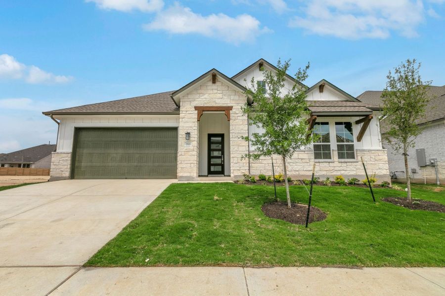 Representative exterior photo of a completed home built from the Roosevelt by GFO Home in Bluffview Reserve, Leander, TX (Image 20).