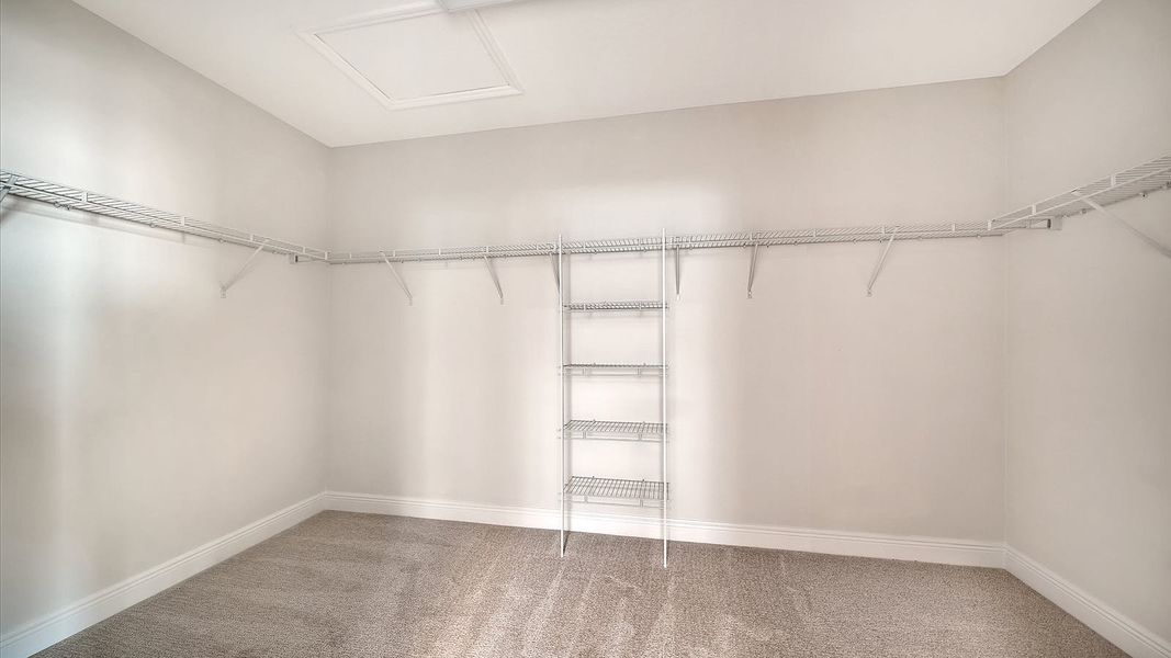 Spacious, unfurnished interior of a new home in Palm Grove Real Estate and Homes for Sale in Lakewood Ranch, FL - Neal Communities, Bradenton (Image 14).