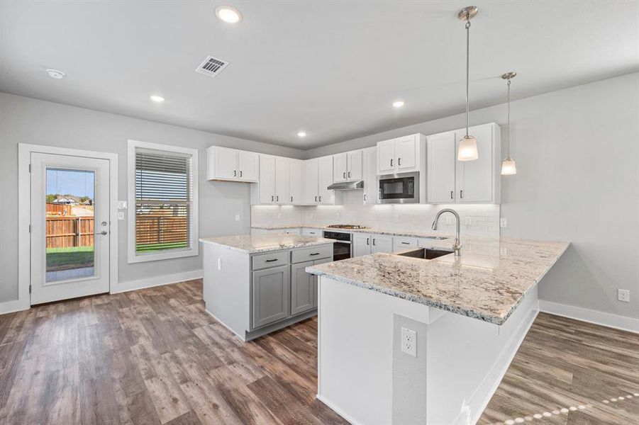 Furnished interior view inside a new home in Heritage Towne, Grand Prairie (Image 14).