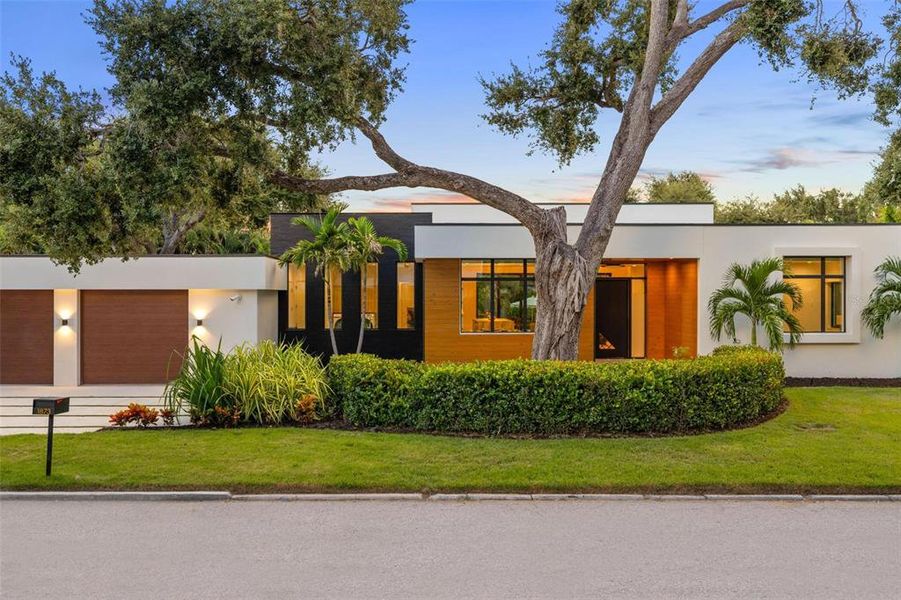 Front exterior of a new home in , Sarasota, FL, highlighting curb appeal (Image 26).