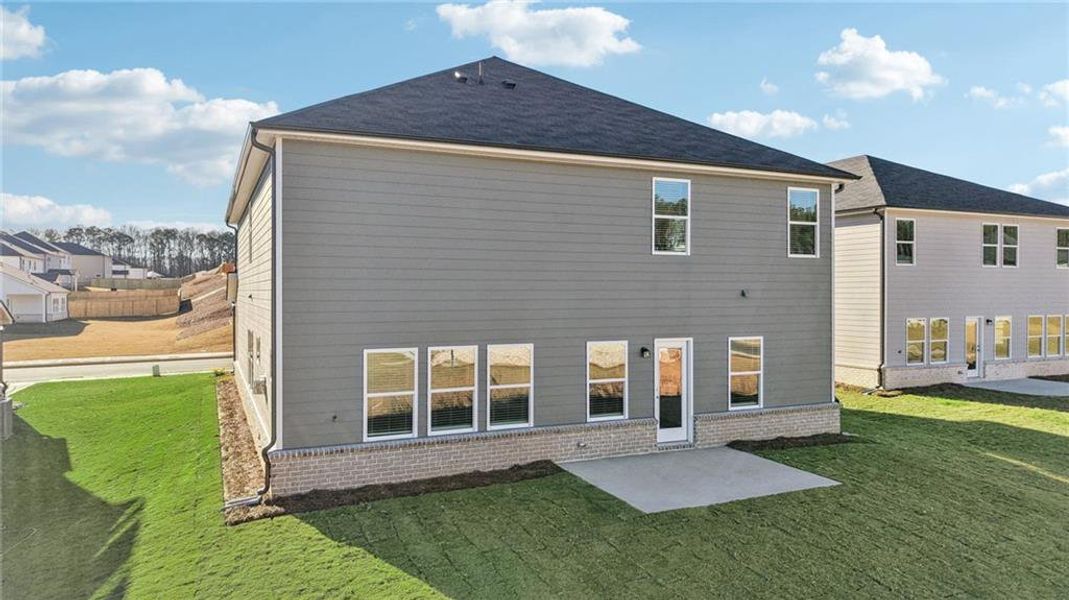 Exterior details and patio area of a home in Parkside at Grayson, Grayson (Image 26).