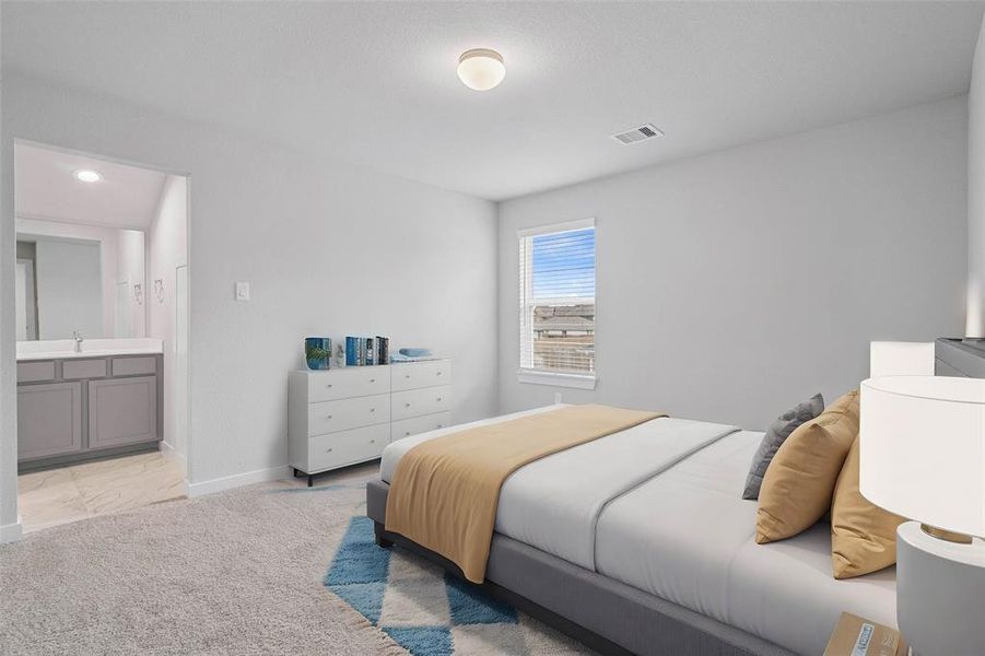 Secondary bedroom features plush carpet, custom paint, high ceilings, large window with privacy blinds and access to its own private vanity shared club bath.