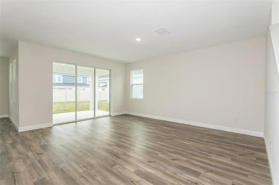 Spacious, unfurnished interior of a new home in Pasadena Woods, Dade City (Image 17).