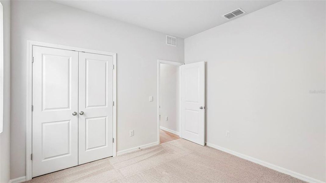 Spacious, unfurnished interior of a new home in Legacy Preserve, Parrish (Image 20). Spacious, unfurnished interior of a new home in Legacy Preserve, Parrish (Image 20).