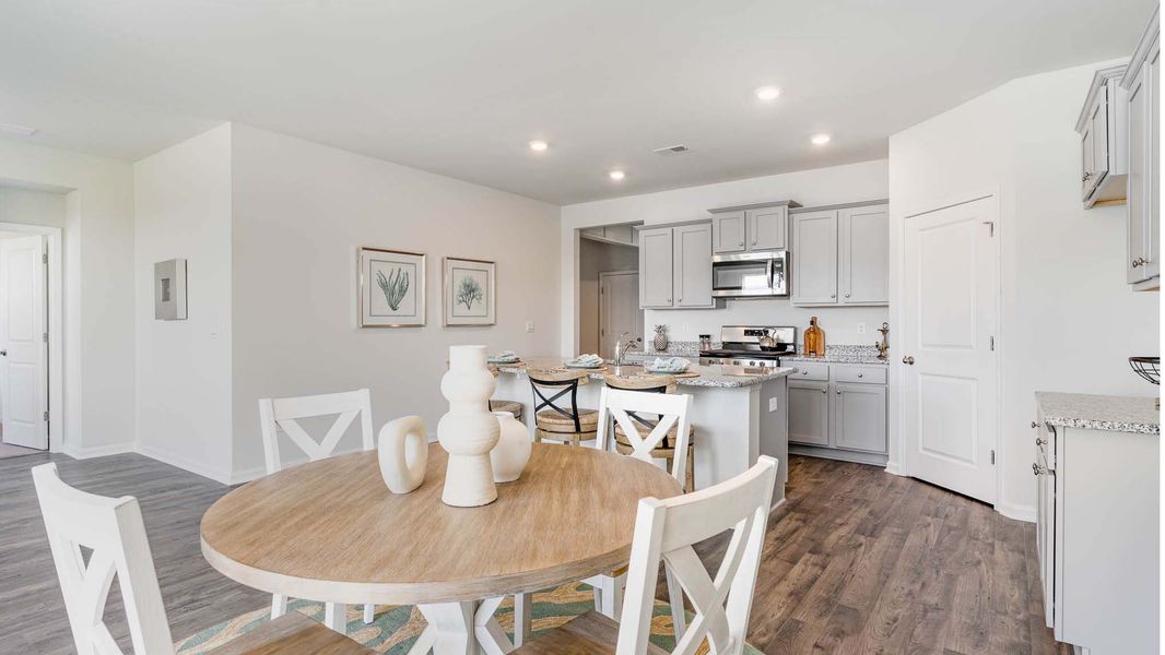 Representative furnished interior of a home built from the CALI by D.R. Horton in Eden Springs, Longs (Image 17).