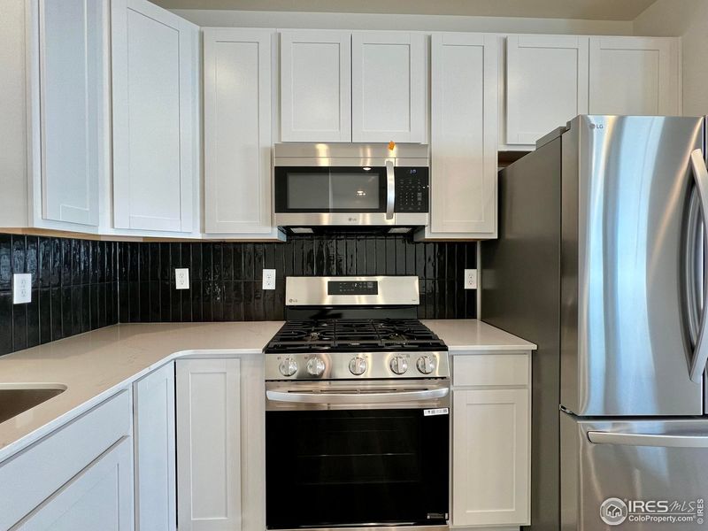 Furnished interior view inside a new home in Union Colony West, Greeley (Image 10).
