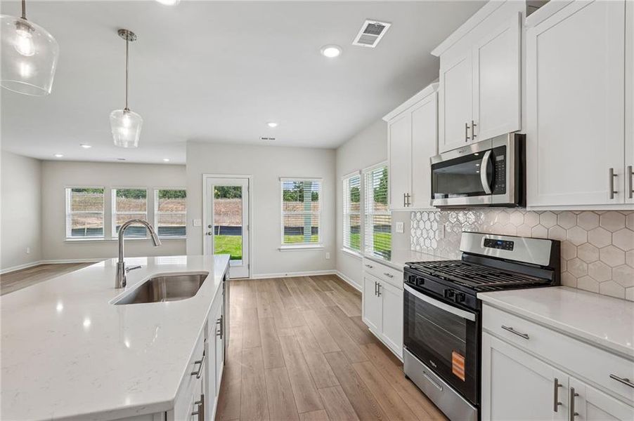 Furnished interior view inside a new home in Northwoods at Mirror Lake, Villa Rica (Image 10).