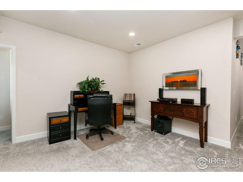 Furnished interior view inside a new home in Kinston at Centerra, Loveland (Image 24).
