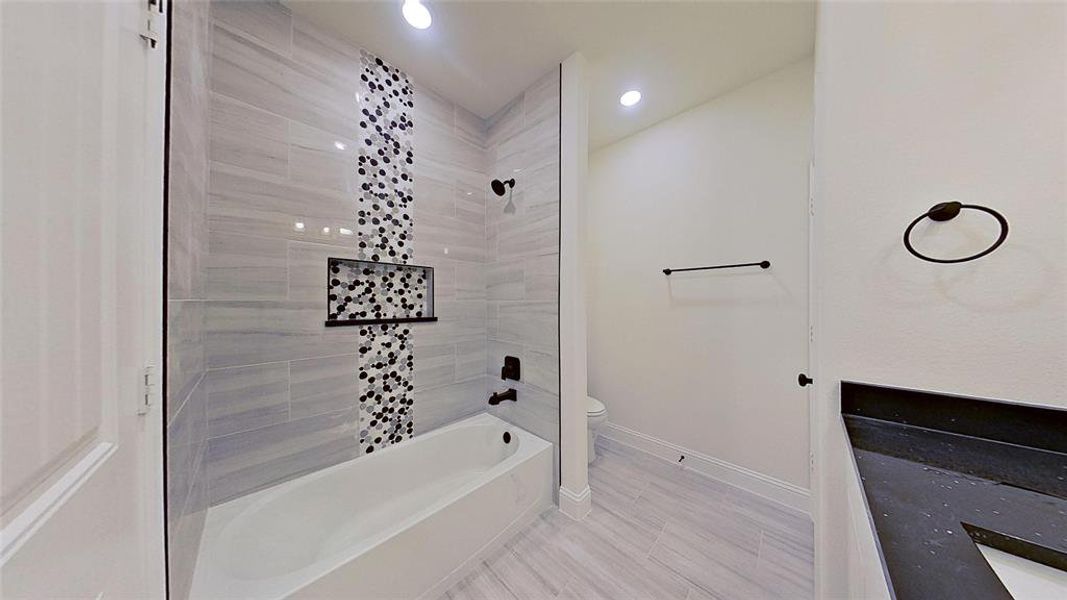 Bathroom with vanity and baseboards Bathroom with vanity and baseboards