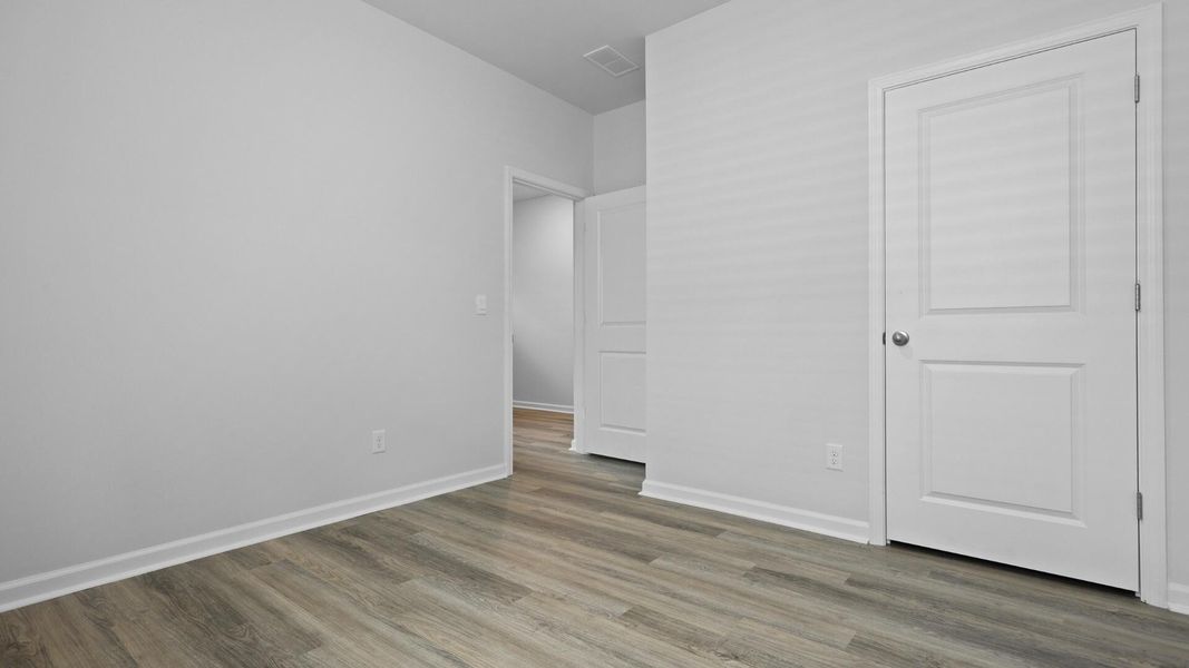 Spacious, unfurnished interior of a new home in Hillcrest, Ravenel (Image 18). Spacious, unfurnished interior of a new home in Hillcrest, Ravenel (Image 18).