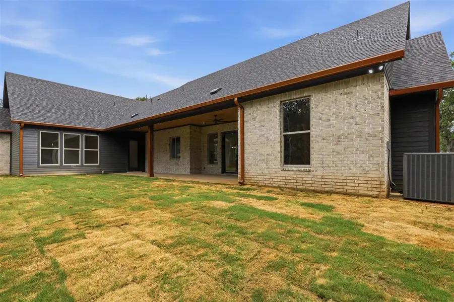 Exterior details and patio area of a home in , Granbury (Image 30). Exterior details and patio area of a home in , Granbury (Image 30).