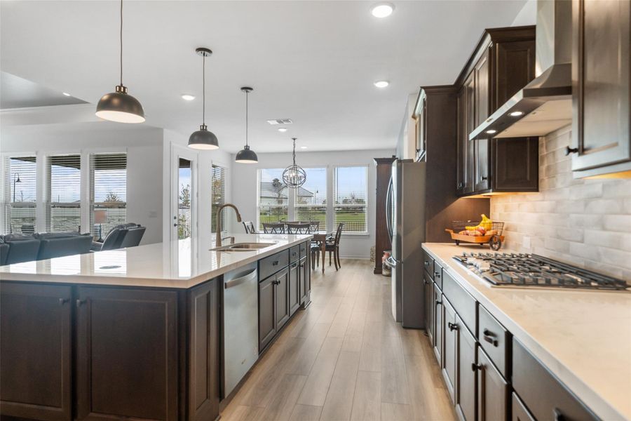 Gorgeous kitchen features Dekton counters, which are described as heat, scratch and stain resistant and very durable.