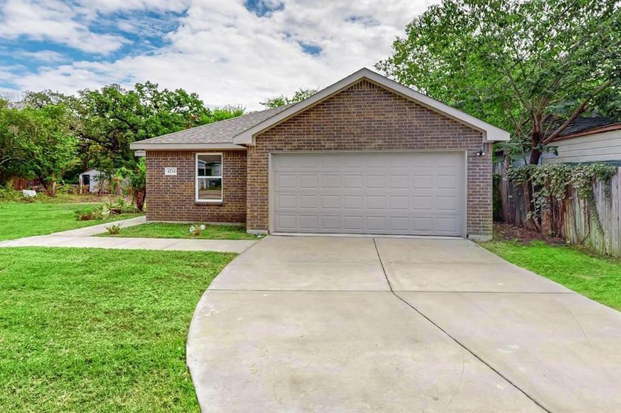 View of front of home with a front lawn