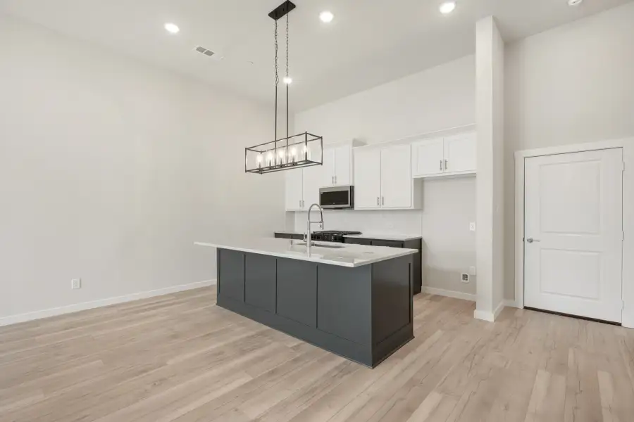 Furnished interior view inside a new home in Cottonwood Creek, Rowlett (Image 6).
